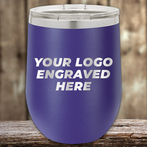 A Custom Kodiak Coolers purple tumbler with "Your Logo Engraved Here" and a silver lid rests elegantly on wood, ideal for corporate gifts.