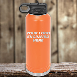 A Kodiak Coolers custom logo laser engraved orange water bottle with vacuum-sealed insulation technology.