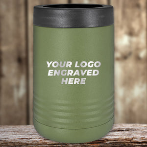 The Kodiak Coolers green insulated tumbler features a black lid and the phrase "Your Logo Engraved Here" laser etched on it. Set against a wooden background, this stylish tumbler makes an ideal corporate gift with no setup fees in this limited-time offer.