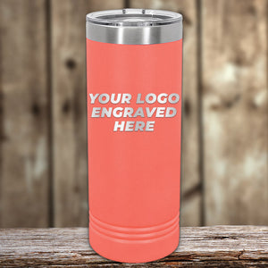 A coral insulated tumbler with a stainless steel lid by Kodiak Coolers, laser etched with "Your Logo Engraved Here" in bold white on a rustic wooden background. These custom tumblers, featuring no setup fees, are perfect for corporate gifts, blending style and personalization seamlessly.