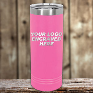 Kodiak Coolers' pink custom tumbler with laser-etched "Your Logo Engraved Here" stands out as an ideal corporate promotional gift, displayed on a wooden surface against a blurred wooden background.