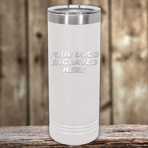 A white insulated tumbler from Kodiak Coolers, featuring a laser-etched logo, rests on a wooden table against a rustic background. This custom tumbler, with no setup fees and a limited-time offer, is perfect as a corporate promotional gift to showcase your brand.