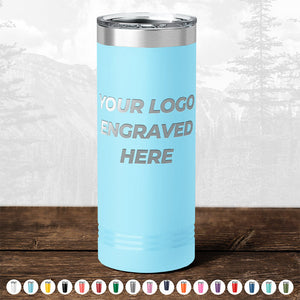 A Kodiak Coolers light blue insulated tumbler with a silver lid and the text "YOUR LOGO ENGRAVED HERE" displayed on the side, perfect as custom drinkware for any occasion. Various color options are shown below the tumbler. Take advantage of our HUGE LABOR DAY SALE - ENDS TODAY!