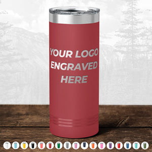 The Kodiak Coolers Custom Drinkware features a stainless steel tumbler with "Your Logo Engraved Here" text in red. Various color options are represented by smaller icons at the bottom, set against a blurred outdoor scene. This personalized mug is perfect as a promotional gift, especially with the HUGE LABOR DAY SALE ending today!