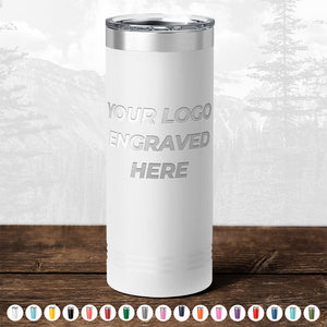 A black insulated tumbler from Kodiak Coolers is placed on a wooden surface, featuring the text "Your Logo Engraved Here"—a perfect choice for a promotional gift. Various color options are available for these custom mugs. Check out our Black Friday Sale: No setup fee, one-side logo included in the price, with a $250 minimal order required.