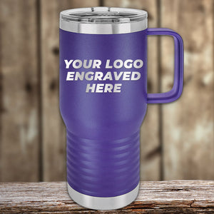 A Kodiak Coolers purple travel mug with "Your Logo Engraved Here," featuring a sturdy handle and clear lid, ideal as a promotional gift, is placed on a wooden surface. This custom tumbler offers laser-etched design with no setup fees for a limited time.