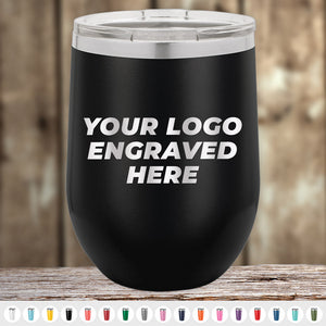 A black Kodiak Coolers Custom Tumblers with Logo Engraved | Laser Etched Design | No Setup Fees | Fast Turn Around | Throwback Thursday Pricing tumbler with the text "YOUR LOGO ENGRAVED HERE" displayed on it. A variety of custom engraved tumbler color options are shown at the bottom of the image, making it perfect for a corporate promotional gift.