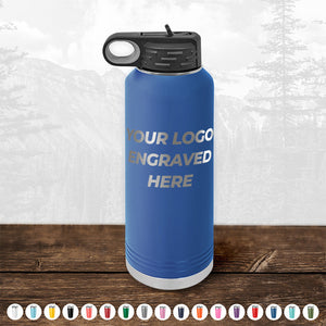 Kodiak Coolers Custom Water Bottles 40 oz with your Logo or Design Engraved - Low 6 Piece Order Minimal Sample Volume displayed on a wooden surface, perfect as promotional items.