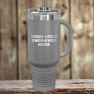 A Kodiak Coolers custom gray tumbler with a straw and your business logo laser engraved on it.